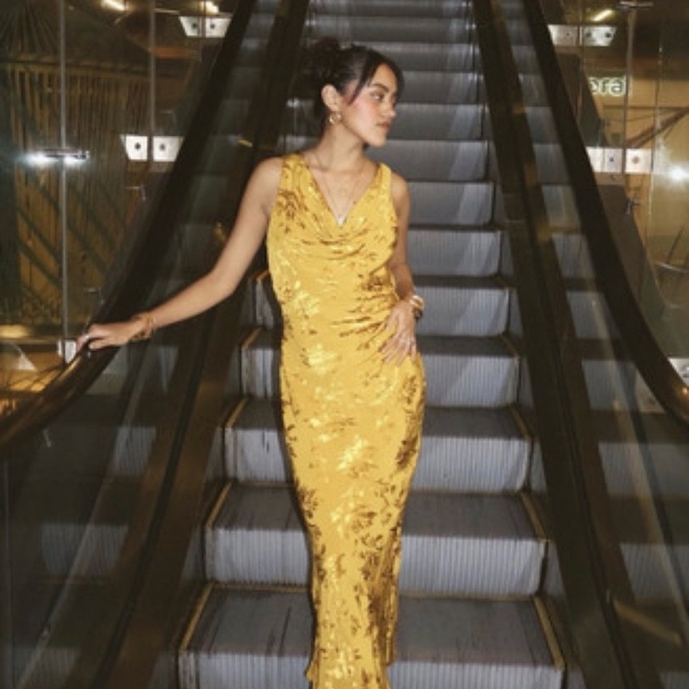 Elegant Yellow Draped Gown